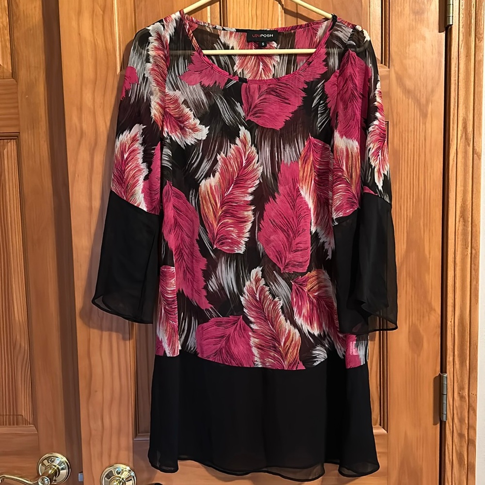 Like new swimsuit coverup in sheer fabric